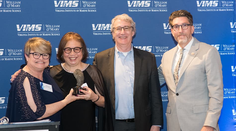 Rick and Susan Hill (center) with VIMS Executive Director of Advancement Marise Robbins-Forbes (left) and VIMS Dean & Director Derek Aday (right)