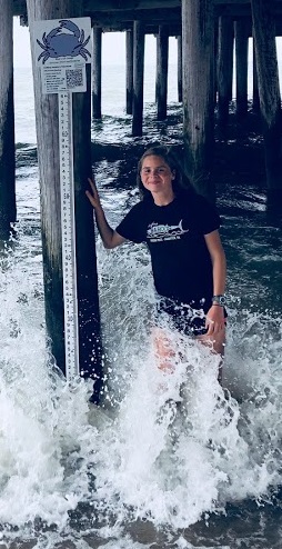 Olivia after Installing the Blue Crab Gauge on the Buckroe Beach Pier